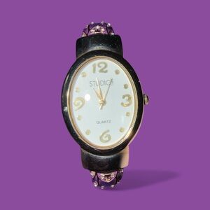 🌹Studio Time women's quartz analog watch with a purple cuff bangle band.